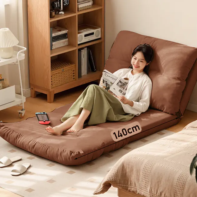 Jesse Sofa Bed - Brown Corduroy - 4 - Luxurious brown bean bag chair, 140cm height, comfortable seating, woman reading