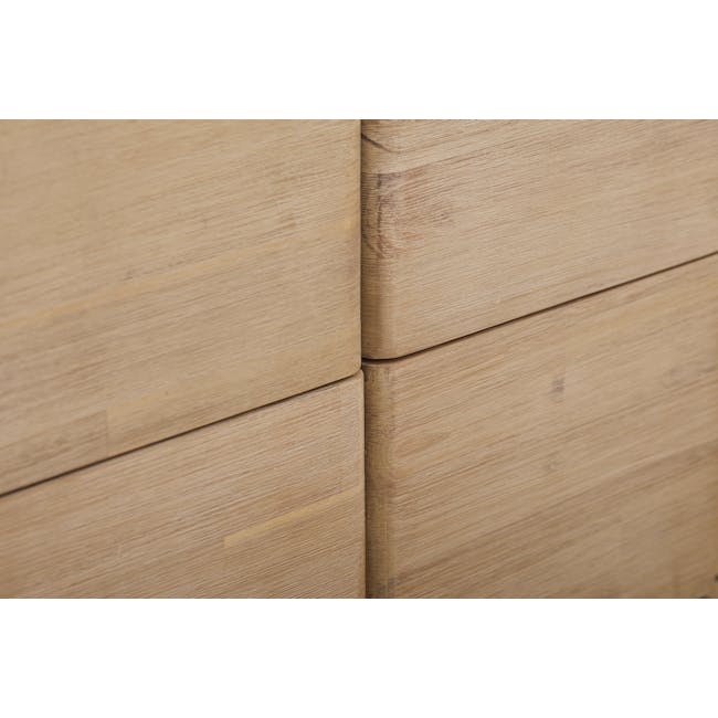Catania 6 Drawer Chest 1.55m - 17 - Light brown wooden surface, close-up view, textured grain, natural wood color, smooth