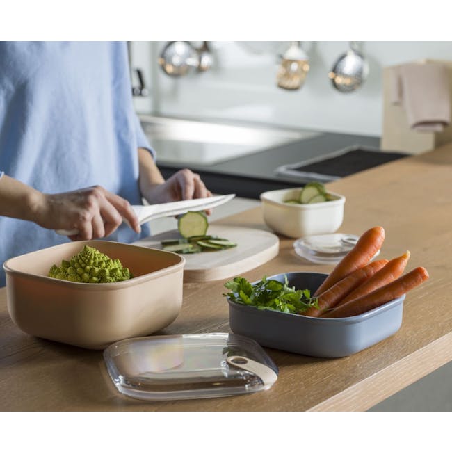 Omada PULL BOX Square Container Set - Sunrise - 2 - fresh vegetables, kitchen preparation, person slicing cucumber, cutting