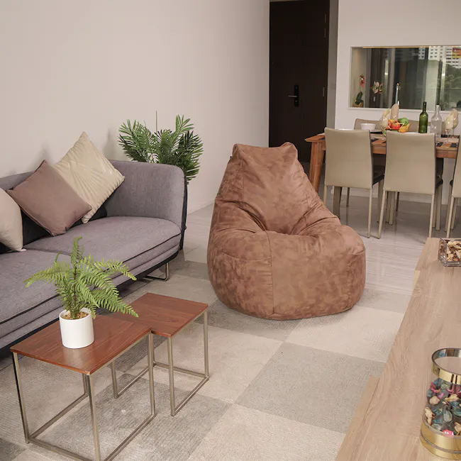 SoftRock Behemoth Bean Bag - Cappuccino - 13 - Modern living room, cozy seating, gray sofa, beige cushions, wooden coffee