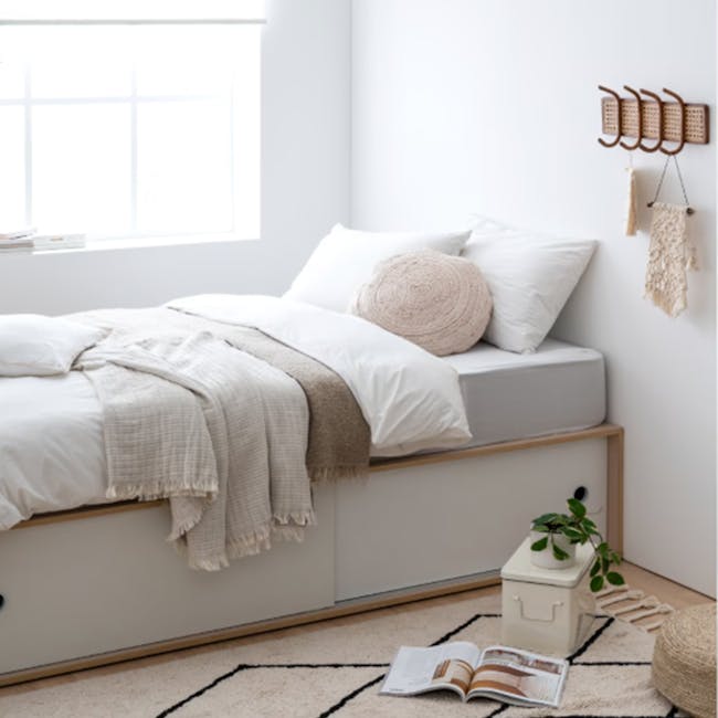 Reyna Super Single Platform Storage Bed - 3 - White minimalist bedroom, cozy bed, natural light streaming, soft bedding