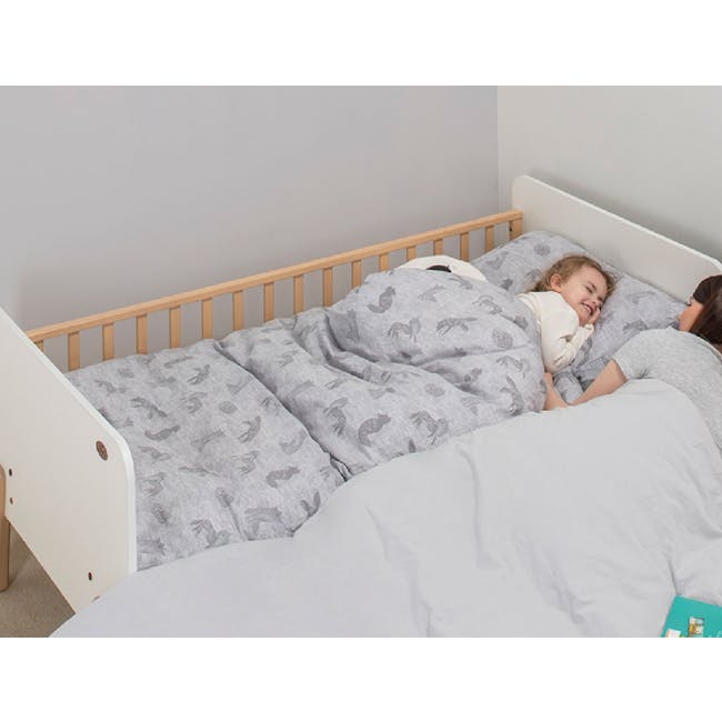 Natty Boori Bedside Bed - Blueberry & Almond - 2 - child, crib, wooden crib, light gray bedding, patterned blanket, wooden