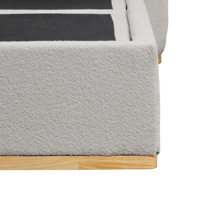 Nova Queen Storage Bed - Light Grey Boucle - 13 - Gray textured bed frame, black and white striped bedspread, wooden floor