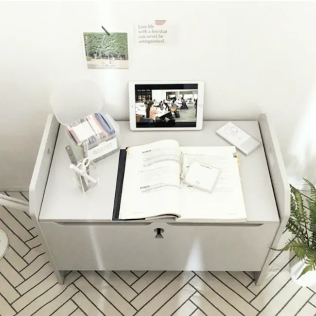 Kidan Kids Treasure Storage Bench - White - 8 - White desk with open book, open notebook, and tablet, modern design