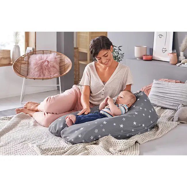 Theraline The Original Maternity and Nursing Pillow - Cream Fine Knit - 6 - Soft cozy bedroom scene, baby lying on bean bag