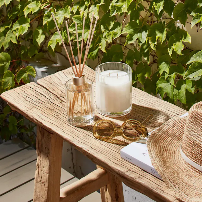 Circa Soy Candle 350g - Coconut & Watermelon - 4 - vibrant green ivy backdrop, rustic wooden table, clear glass jar with