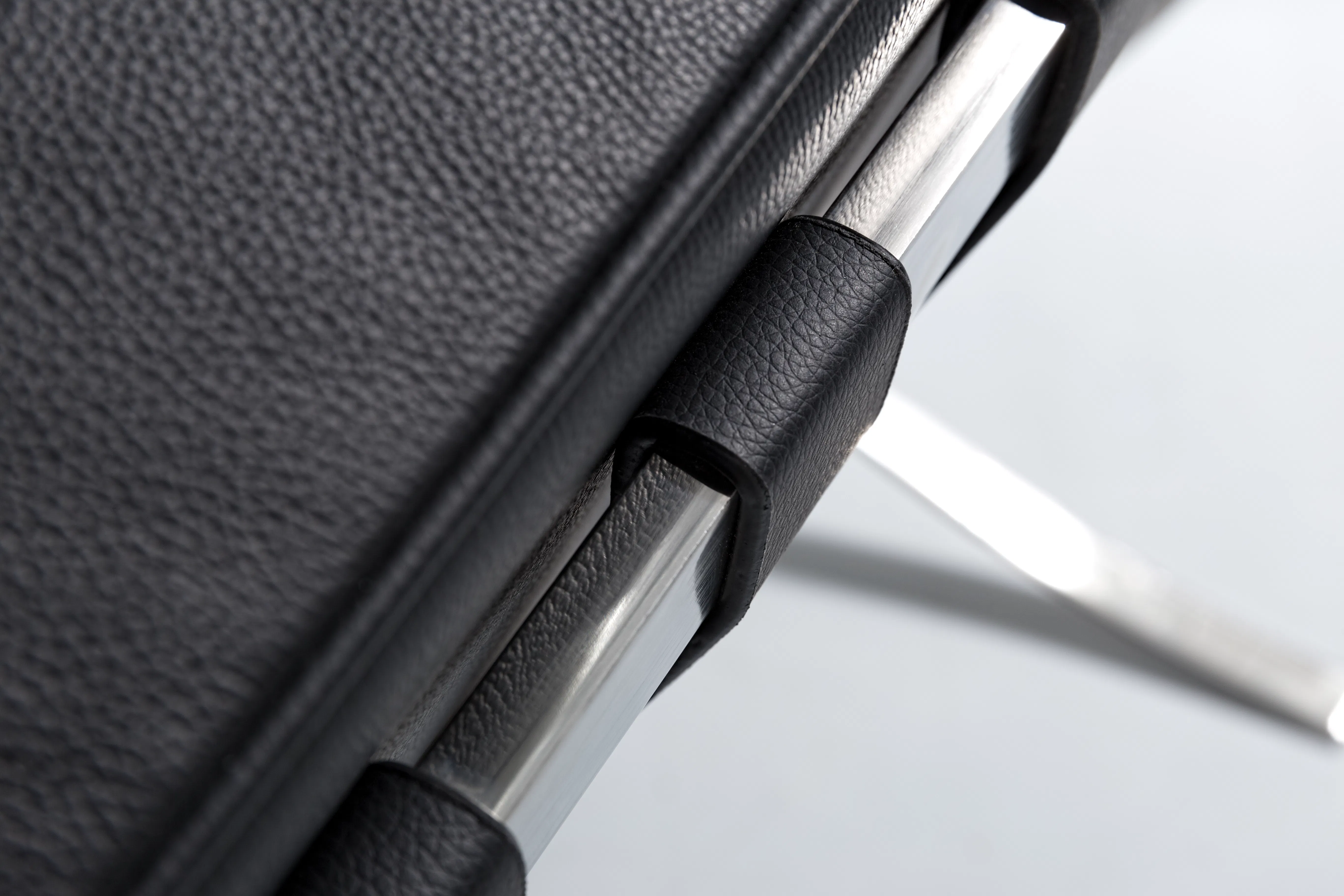 Benton 3 Seater Sofa - Black (Genuine Cowhide) - 9 - Black leather suitcase, metallic zipper, textured surface, ergonomic