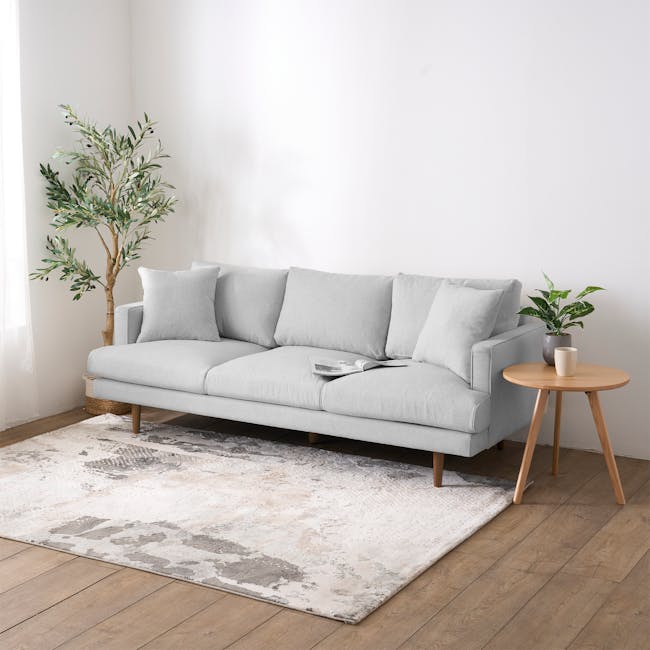 Declan 3 Seater Sofa - Brass, Slate - 25 - Light gray sofa, minimalist decor, natural light, wooden floor, textured rug