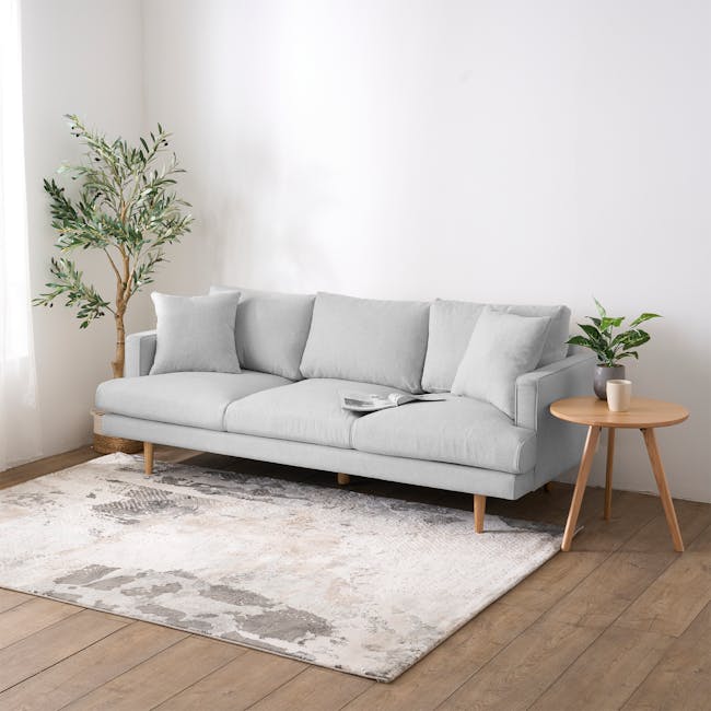 Declan 3 Seater Sofa - Brass, Slate - 13 - Light gray sofa, minimalist decor, natural light, wooden floor, textured rug