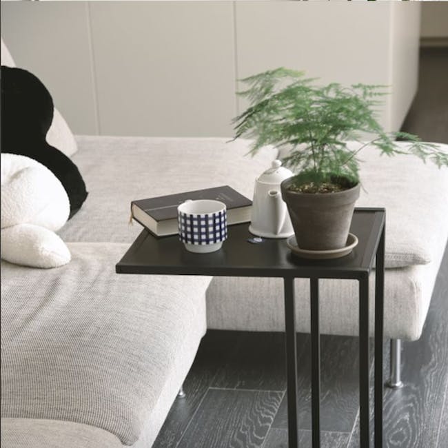 Fraser Side Table - 2 - black side table, minimalist design, cozy living room, modern decor, soft lighting, white ceramic