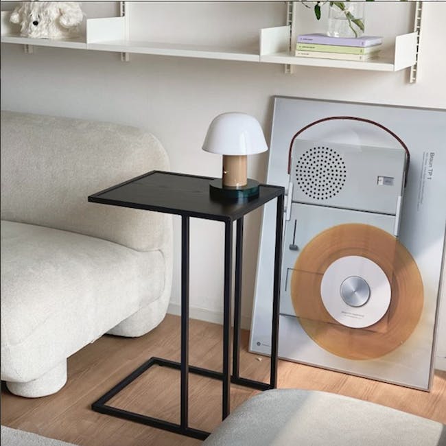 Fraser Side Table - 6 - Modern living room, minimalist decor, cozy sofa, white plush chair, black side table, sleek lamp