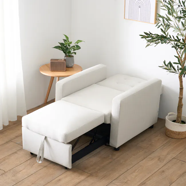 Mason Sofa Bed - Ecru - 15 - White upholstered sofa, minimalist decor, wooden floor, potted plant, natural light, modern