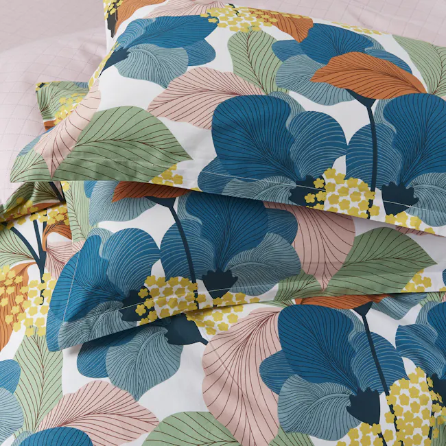 Carla 5-pc Cotton Bedding Set (4 Sizes) - 3 - Floral print with large blue leaves, yellow flowers, and green leaves, layered