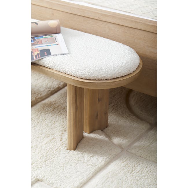 Catania Cushioned Bench 1.2m - 7 - Wooden footstool with fluffy white cushion, soft beige carpet, natural wood texture, cozy