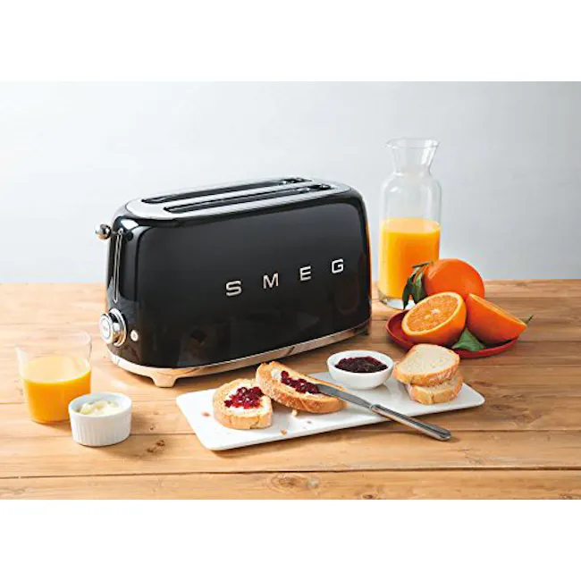 Smeg 2-Slice Toaster - Black - 2 - Toasted bread, orange juice, berries, jam, honey, glass of orange juice, sliced oranges