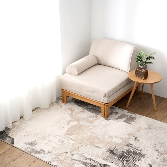 Zara Sofa Bed - Gravel White - 2 - Cream sofa, white curtains, wooden floor, light beige cushions, round wooden table, green