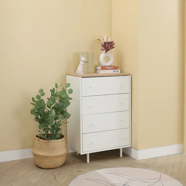 Madeline Modular 4 Drawer Chest 0.6m - 4 - White dresser with four drawers, beige wall, green potted plant, woven basket