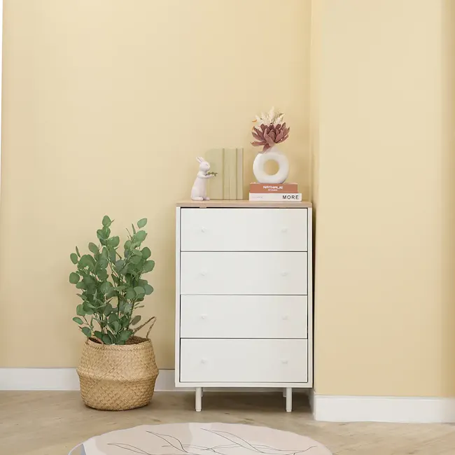 Madeline Modular 4 Drawer Chest 0.6m - 10 - White dresser with four drawers, beige wall, green potted plant, white rabbit