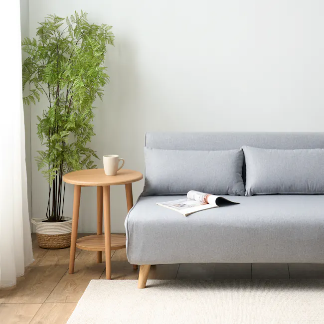 Noel 2 Seater Sofa Bed - Harbour Grey - 6 - Light gray sofa, light wooden coffee table, white ceramic mug, light blue