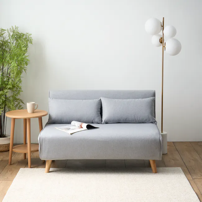 Noel 2 Seater Sofa Bed - Harbour Grey - 5 - Modern minimalist living room, cozy sofa, light gray fabric, wooden legs, round