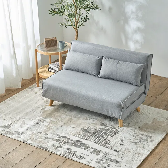 Noel 2 Seater Sofa Bed - Harbour Grey - 2 - Grey sofa, light wood legs, textured rug, modern decor, cozy living room