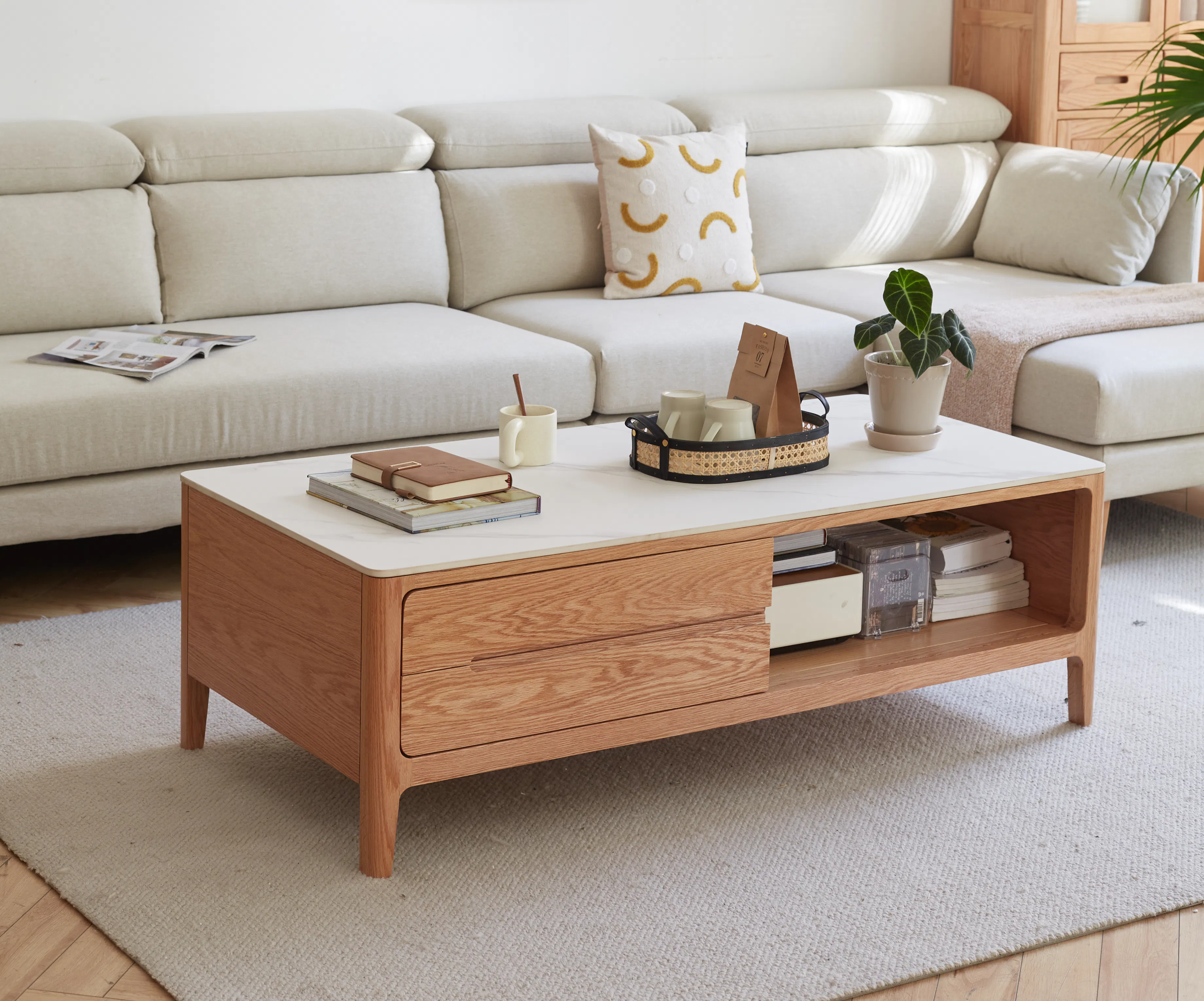 Devin Coffee Table 1m (Sintered Stone) - 20 - Light beige sofa, minimalist decor, wooden coffee table, stack of books, brown
