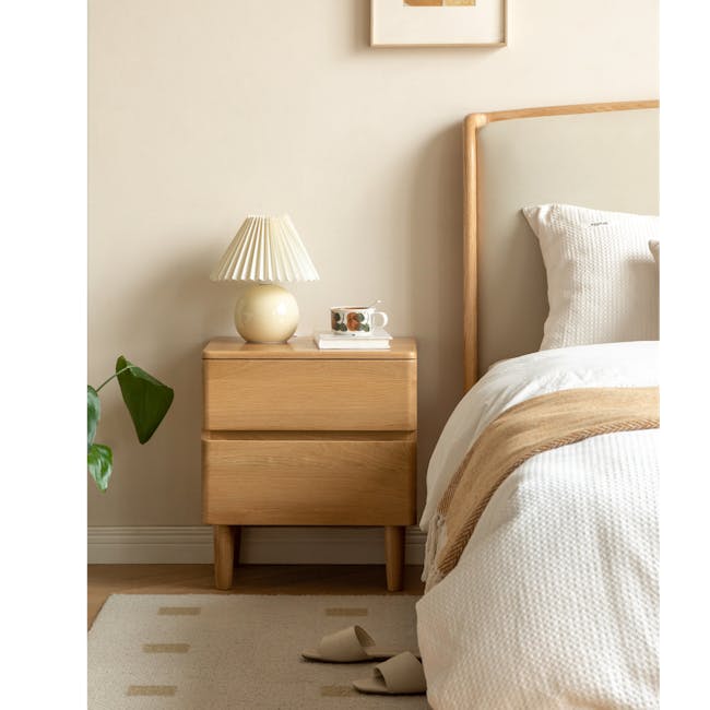 Nova Queen Storage Bed in Light Grey Boucle with 2 Natalia Bedside Tables - 18 - Wooden nightstand, beige lamp, white mug