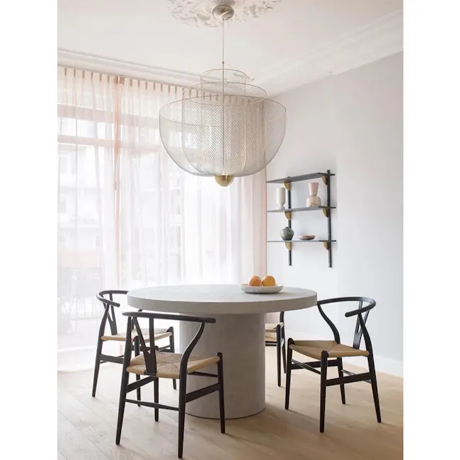 Cameron Pendant Lamp - Chrome - 7 - Modern dining room with circular table and chairs, large woven pendant light fixture