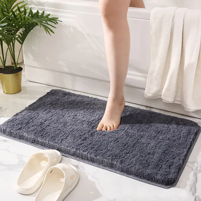 Shiloh Floor Mat - Grey - 2 - Bathtub, white bathtub, gray bath mat, white slippers, potted plant, white towel, bathroom