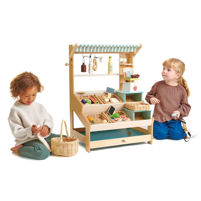 Tender Leaf Toy Kitchen - General Stores - 2 - Children sitting on the floor, one holding a toy, another playing with a toy