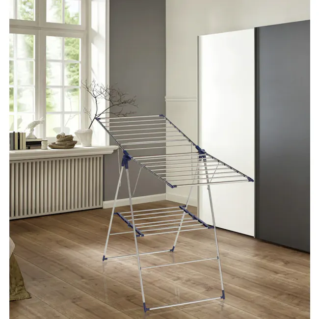 Leifheit Pegasus Flex Stainless Steel Dryer - 2 - Modern minimalist room, large window, natural light, wooden floor, white