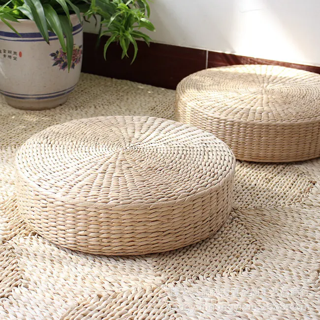 Enzo Floor Cushion - 2 - Wicker round stools, woven texture, natural light, indoor setting, cozy atmosphere, indoor plants