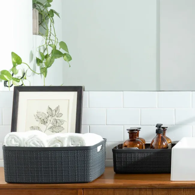 Jute Basket - Grey (3 Sizes) - 4 - Woven basket, neatly folded towels, white towels, black basket, wooden countertop, white