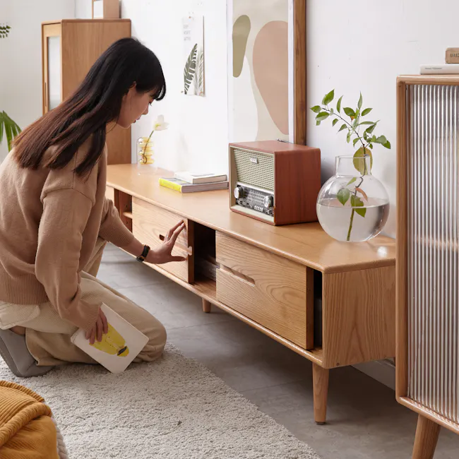 Beau TV Console 1.5m - Oak - 2 - Wooden furniture, woman in beige sweater, book, vintage radio, plant, glass vase, modern