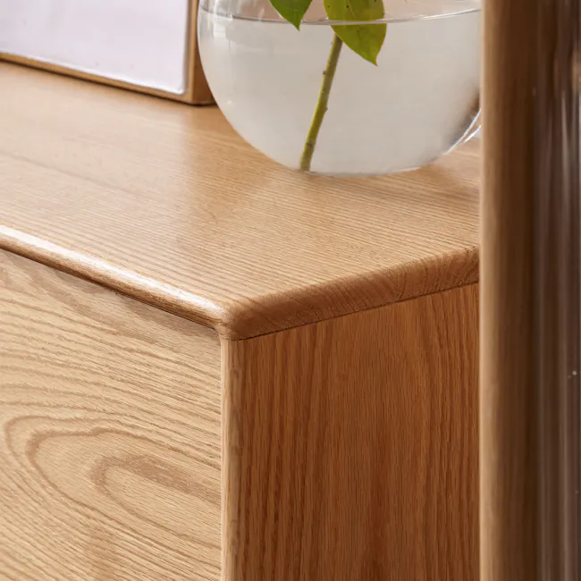 Beau TV Console 1.5m - Oak - 7 - Glass vase with green plant, wooden surface, natural light, clear water, wooden cabinet