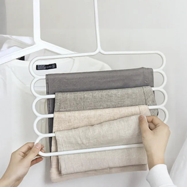 Multi Hanger - Taupe - 4 - White hanger, folded towels, neatly arranged, soft fabric, neutral colors, minimalist design
