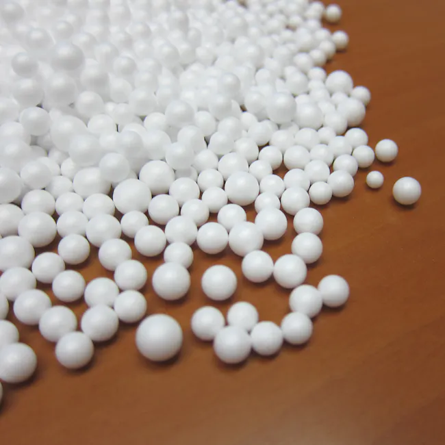 Daisy Bean Bag - Blue - 5 - White spherical beads, scattered on wooden surface, glossy texture, uniform size, soft lighting