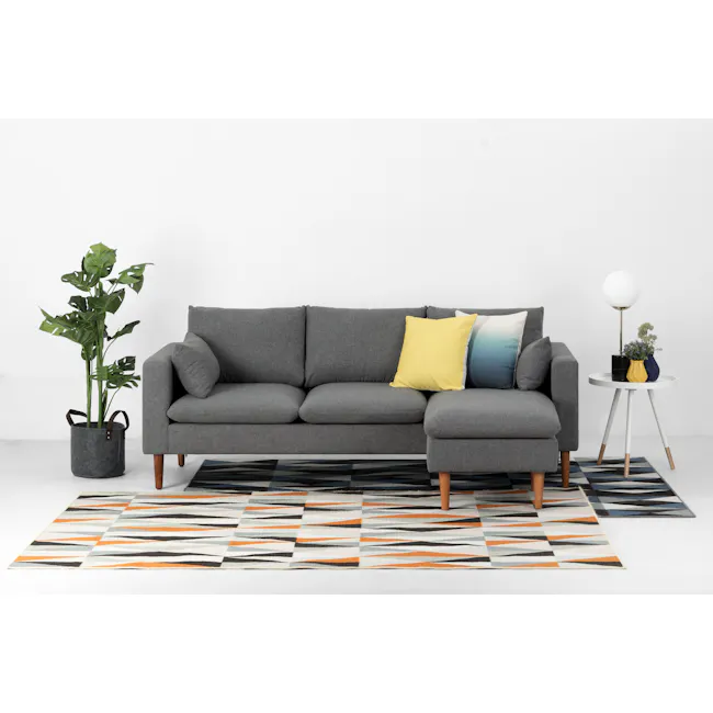 Alicia L-Shaped Sofa - Charcoal Grey - 5 - Modern living room, minimalist design, gray sofa, yellow pillow, abstract pattern