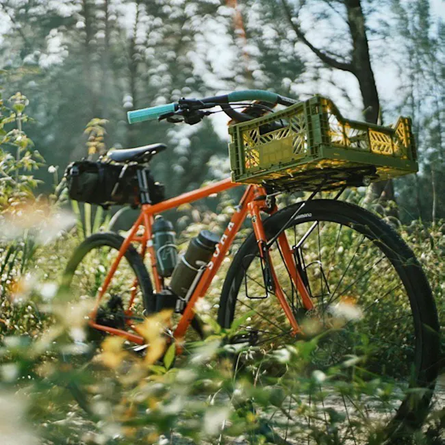 Aykasa Foldable Midibox - Khaki Green - 2 - orange bicycle, forest trail, green basket, black saddle, water bottle, camping