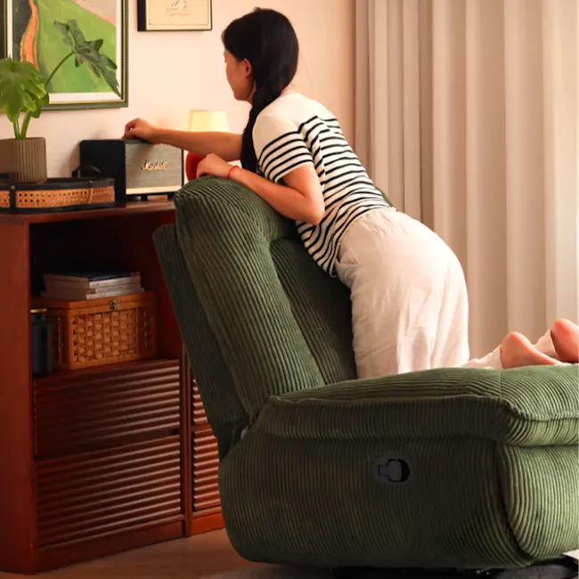 Glen Swivel Manual Recliner Lounge Chair - 7 - striped shirt, green chair, woman leaning, black amplifier, potted plant