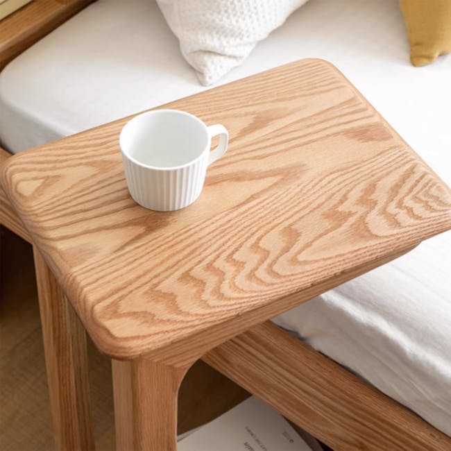 Genia Trolley Side Table - Oak - 8 - Wooden side table, minimalist design, white ceramic mug, natural wood grain, cozy room