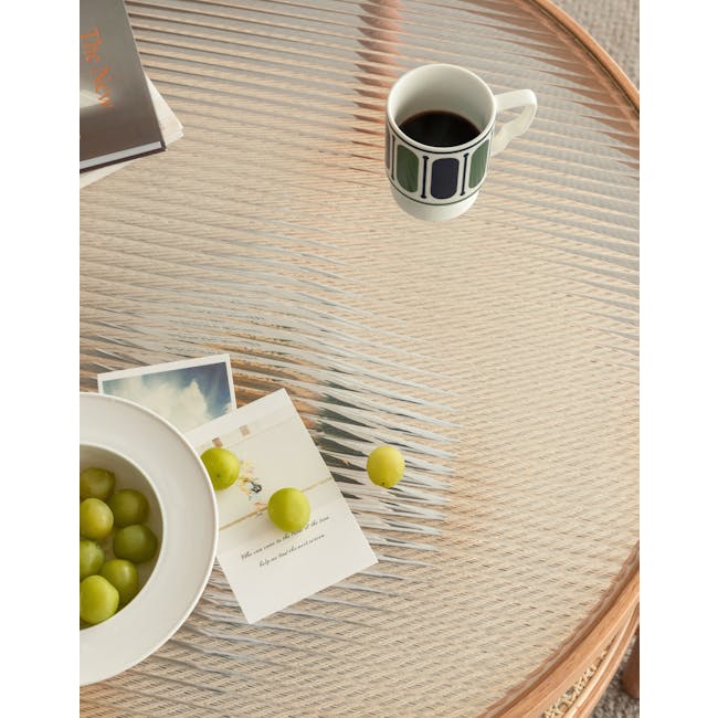 Lilian Rattan Coffee Table - Natural (Glass Tabletop) - 16 - Glass table, green grapes, white bowl, coffee cup, wooden