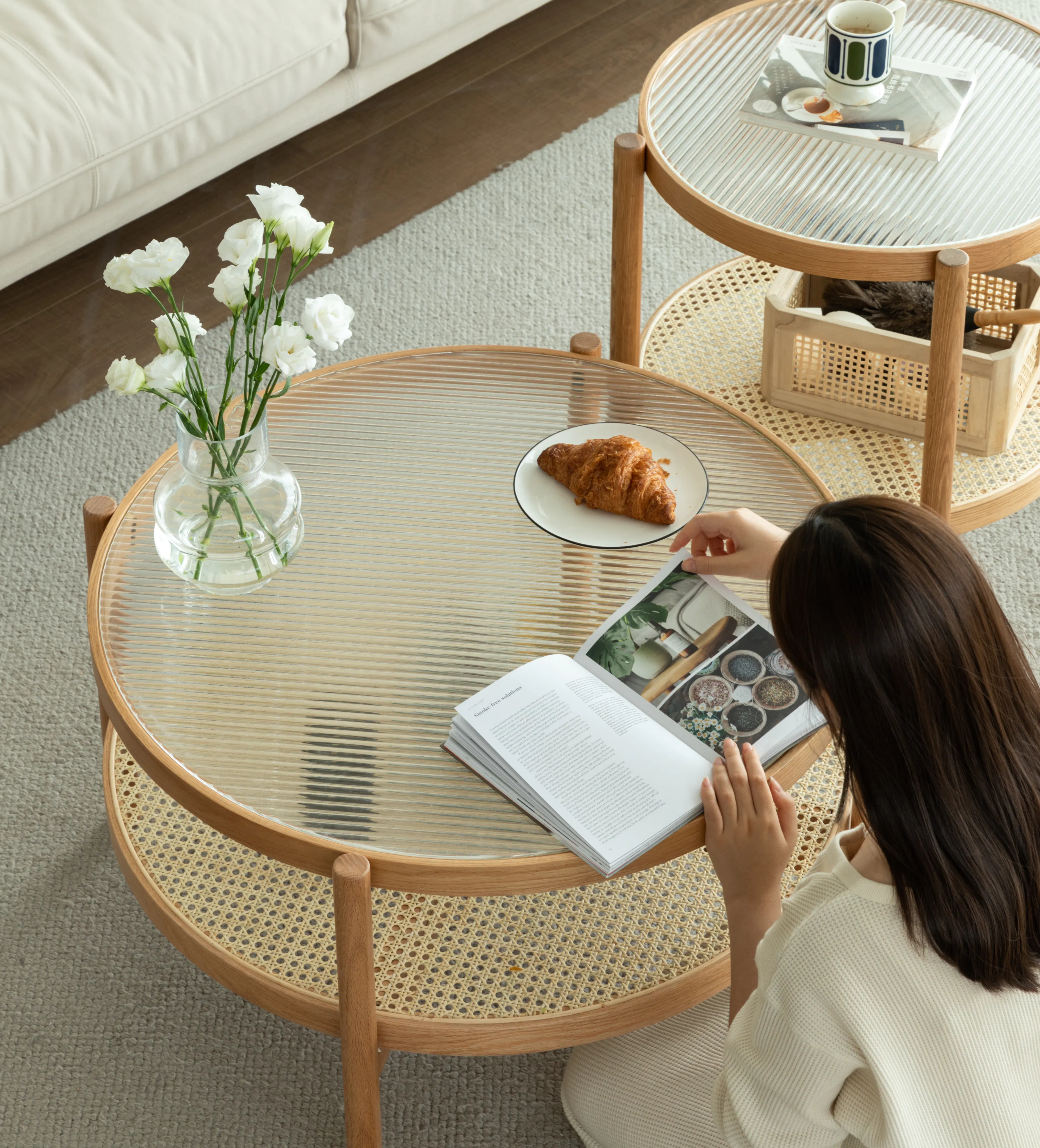 Lilian Rattan Coffee Table - Natural (Glass Tabletop) - 15 - glass coffee table, white flowers, cozy living room, woman
