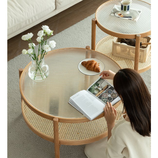 Lilian Rattan Coffee Table - Natural (Glass Tabletop) - 15 - glass coffee table, white flowers, cozy living room, woman