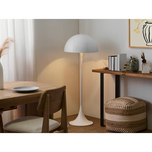 Johann Floor Lamp - White - 2 - White lamp with dome shade, wooden dining table, beige curtains, textured chair, woven