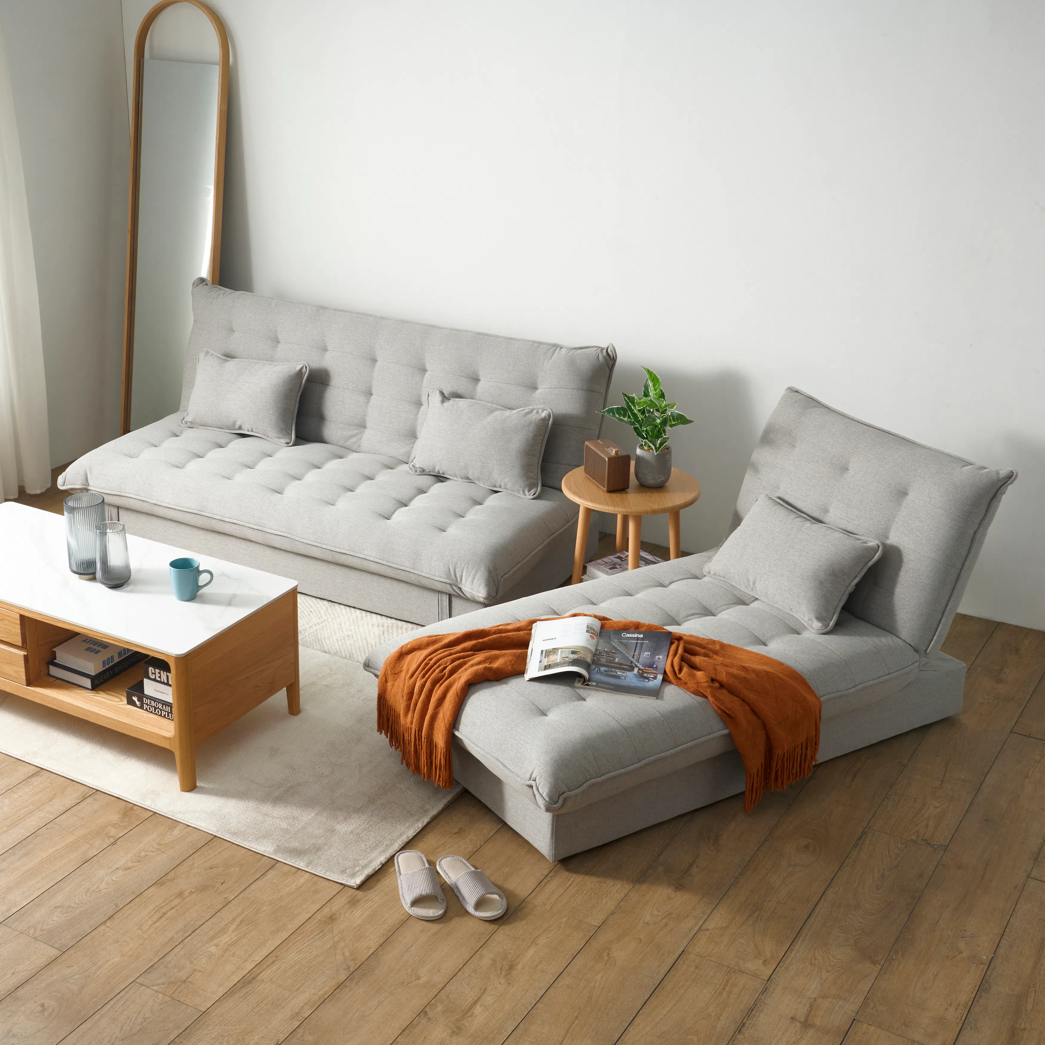 Tessa L-Shaped Sofa Bed - Beige (Eco Clean Fabric) - 40 - Light gray tufted sofa, wooden coffee table, orange throw blanket