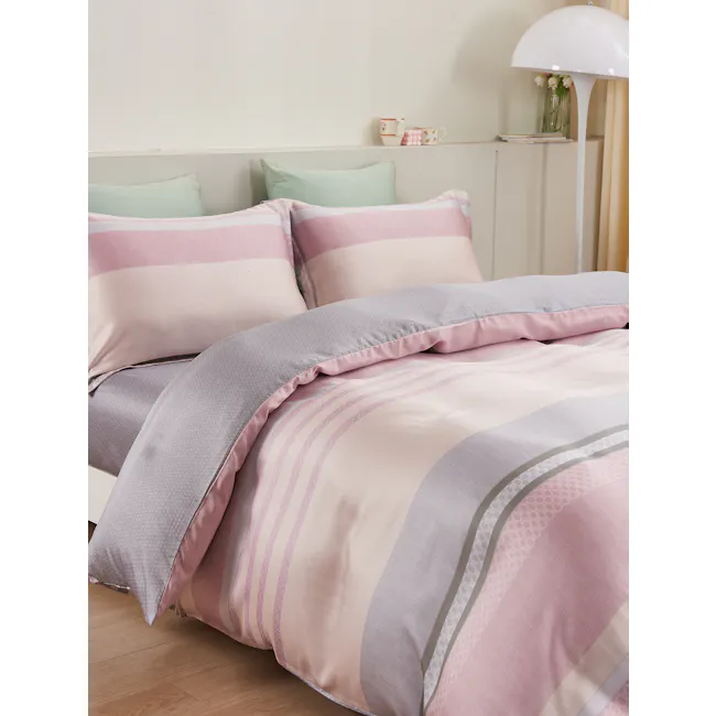 Beverly Tencel Bedding Set (2 Sizes) - 8 - Soft, pastel-colored bedding, pink and gray striped pillows, white lampshade