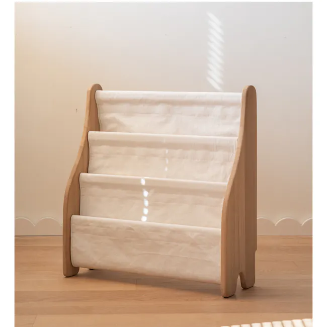 Micah Kids Storage Book Shelf Rack - 8 - Wooden crib with soft beige bedding, minimalist design, natural wood finish, soft