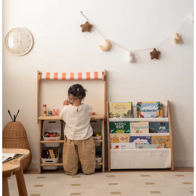 Micah Kids Storage Book Shelf Rack - 15 - Wooden shelf, children's room, child playing, colorful books, toys, wall clock