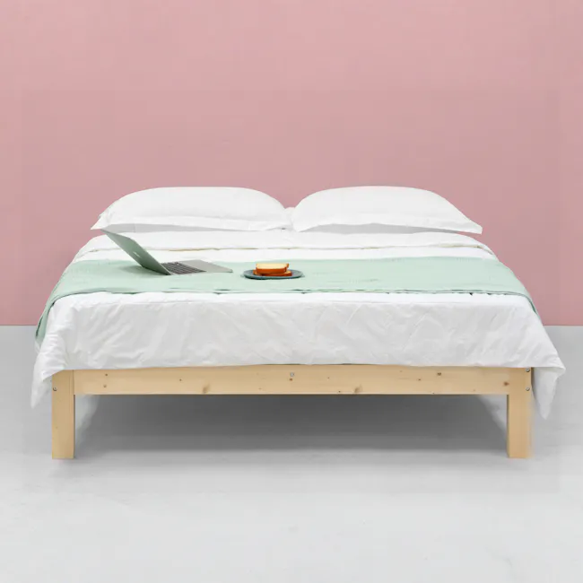 Katana Queen Wooden Headboard Bed - 3 - Laptop on bed, green blanket, white pillows, light wooden bed frame, minimalist